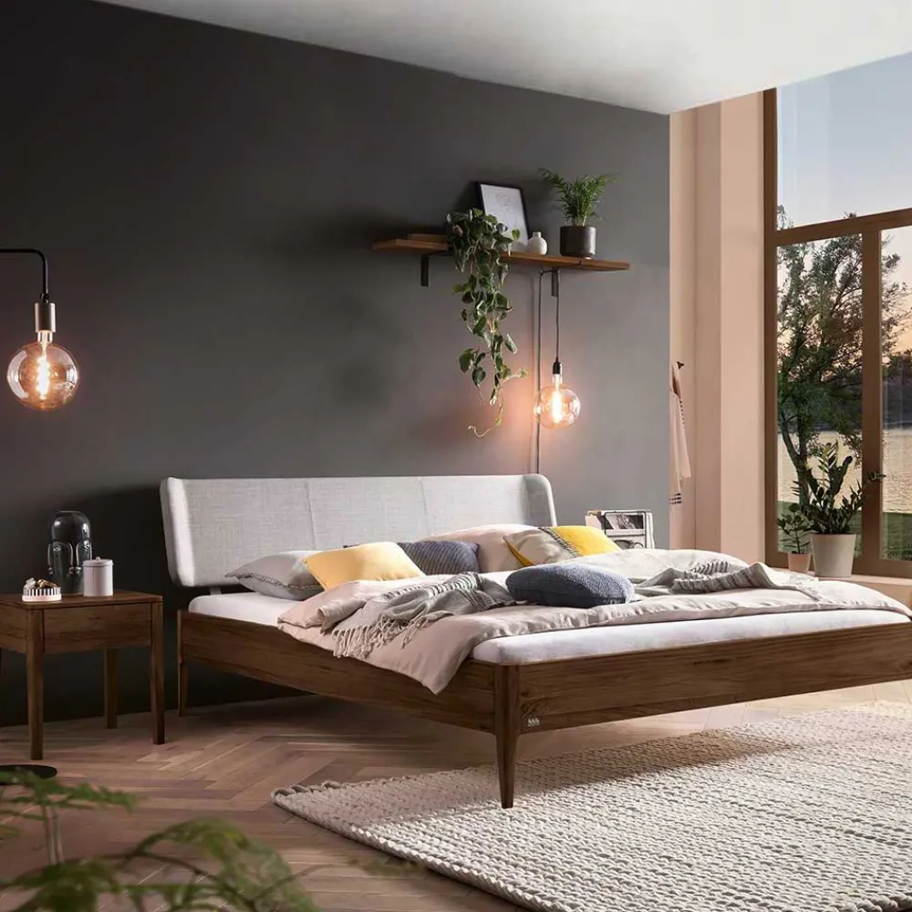 Wohnen Braune Möbel*Nussbaum Bett mit extravagantem Kopfteil - Astosa